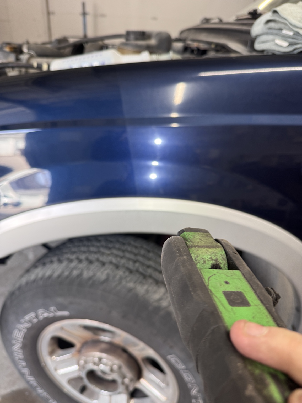 Blue truck paint correction light reflection